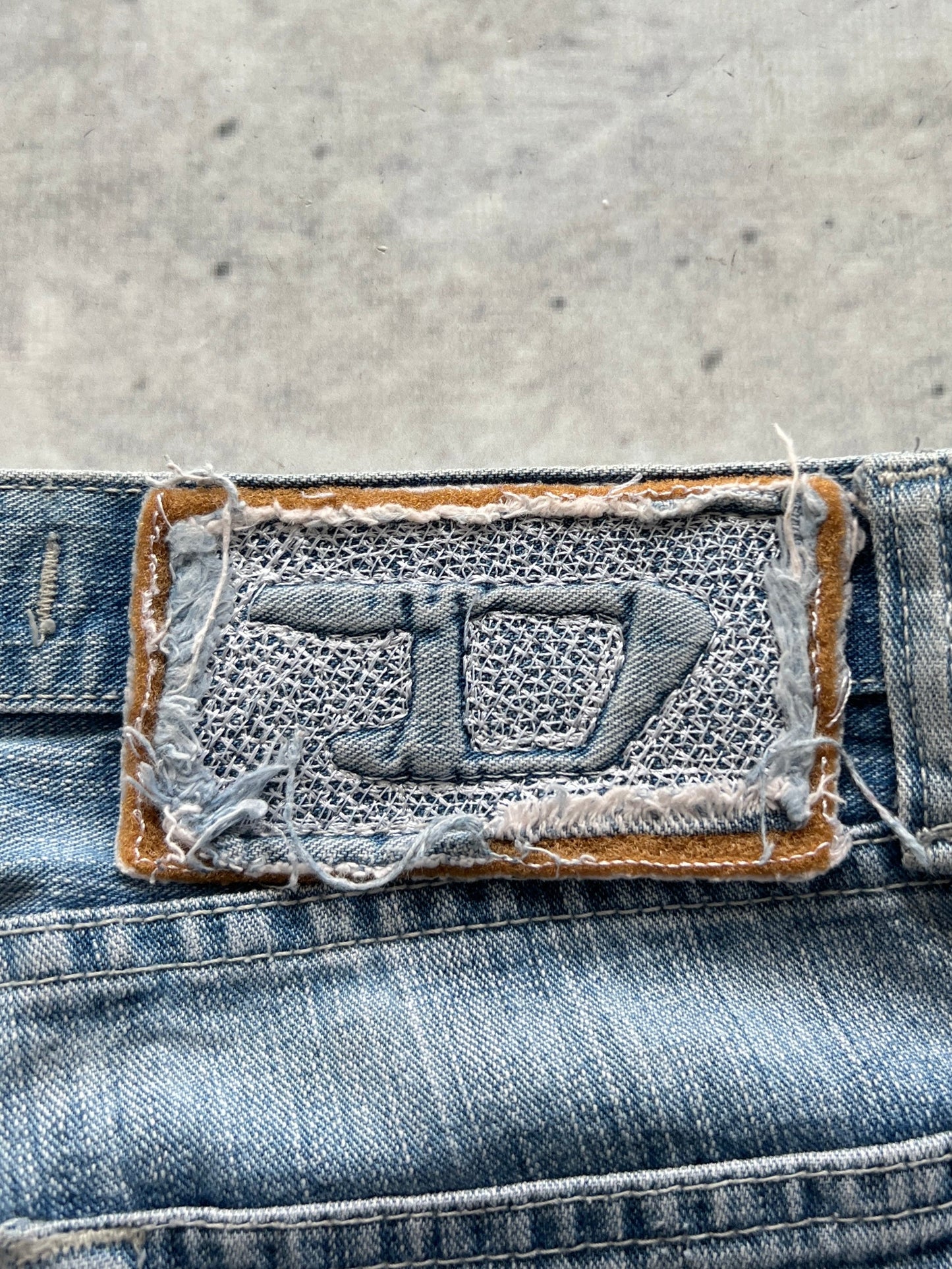 Vintage Diesel spell out Light Wash Jeans (Women's W29)